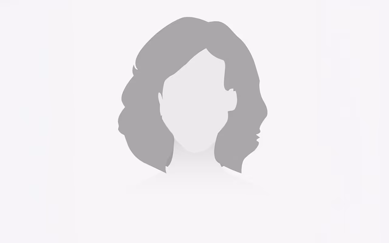 Graue Silhouette eines weiblichen Kopfes und der Schultern mit mittellangem, gewelltem Haar.